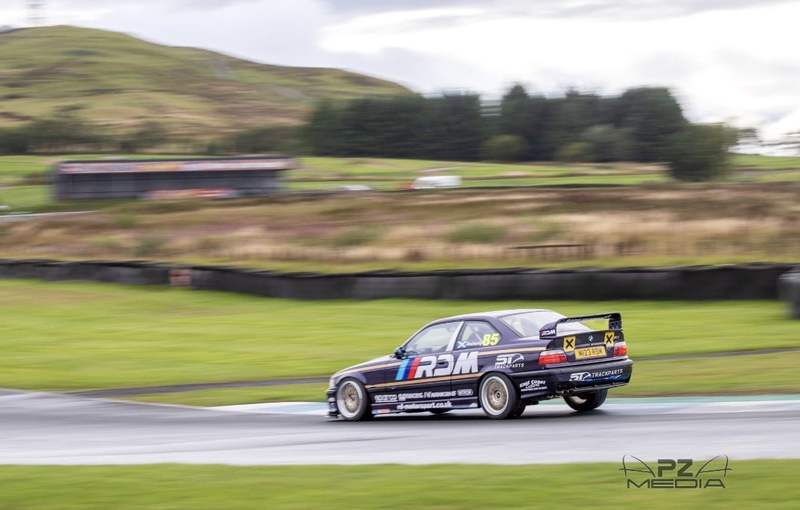 RDM's E36 race car out of the corner
