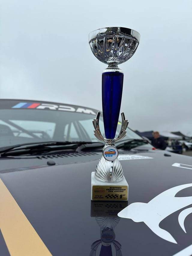 A 1st place trophy from Knockhill on the bonnet of car 85